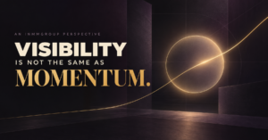Visibility Is Not the Same as Momentum, an inMMGroup perspective represented by a gold trajectory continuing beyond an illuminated circle.